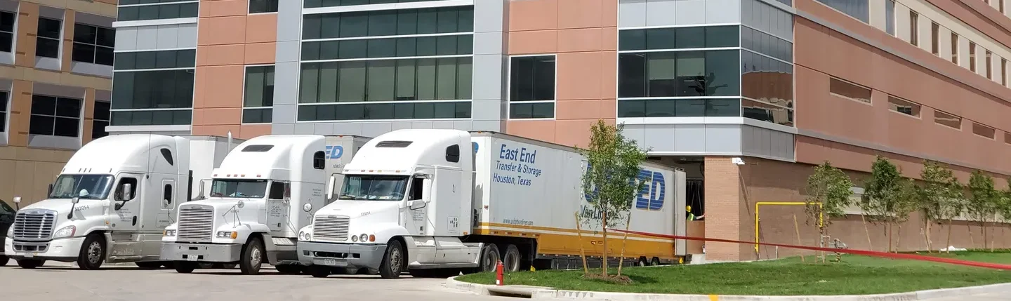 three United Van line Trucks