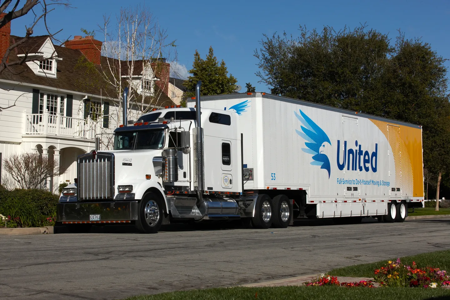 moving van in front of house