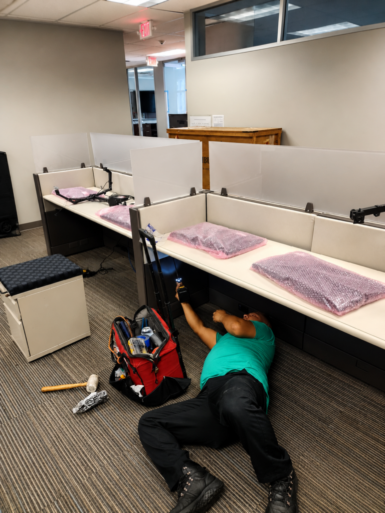 Office movers Houston preparing office workstations for relocation